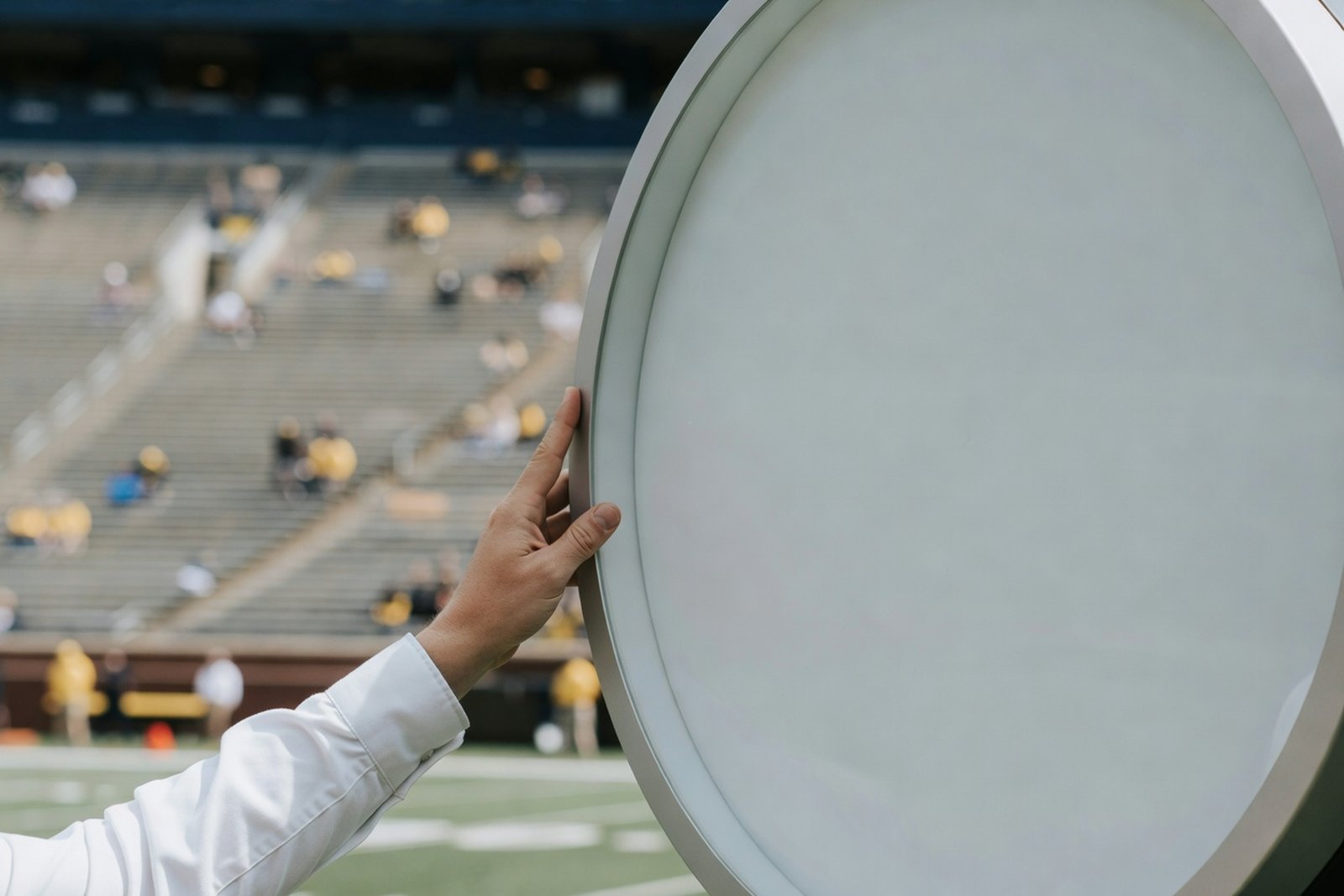 Big Ten Put a Second Back at Michigan Stadium — Sports satirical illustration · SPICY tier · Roast Station editorial